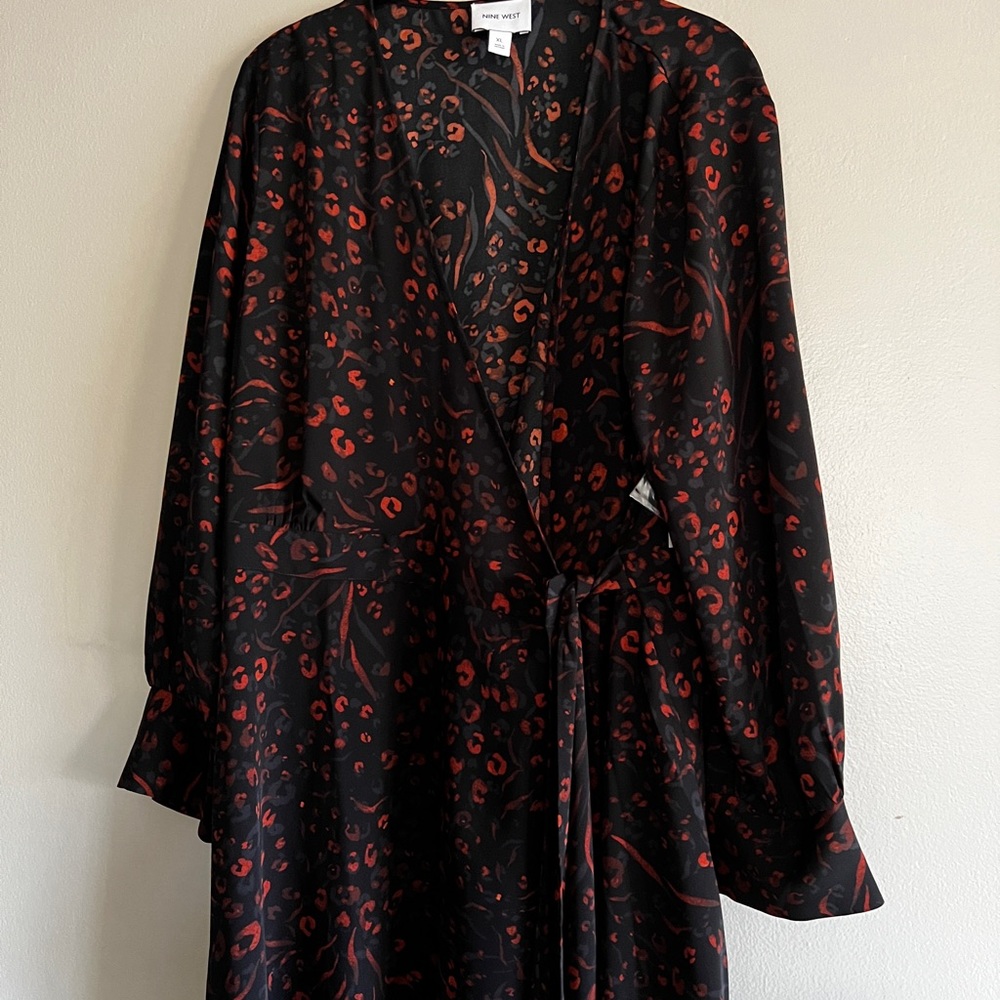New with tags wrap dress, never worn. Non-smoking house.